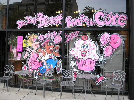 Promotional window art for the "Run for Breast Cancer".