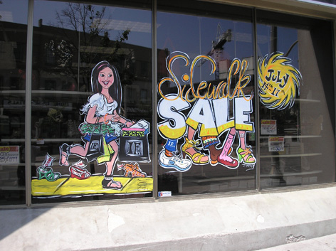 Promotional window art work for local shoe store.