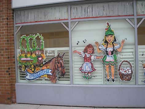 Promotional window art work featuring Oktoberfest for local business in Kitchener/Waterloo.